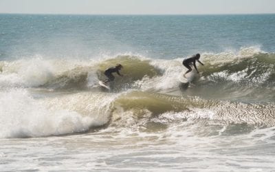 Locals surfing after the storm.  . . .